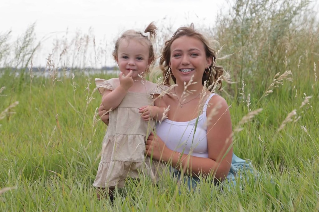 Two girls in the grass